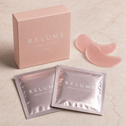 RELUME Under-Eye Masks box with patches and sachets on blush stone